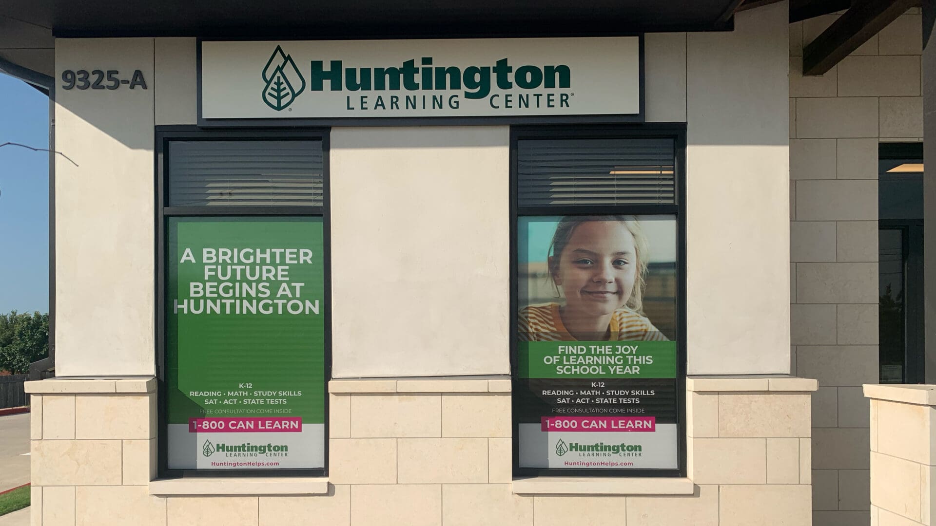 Right window poster featuring smiling student portrait