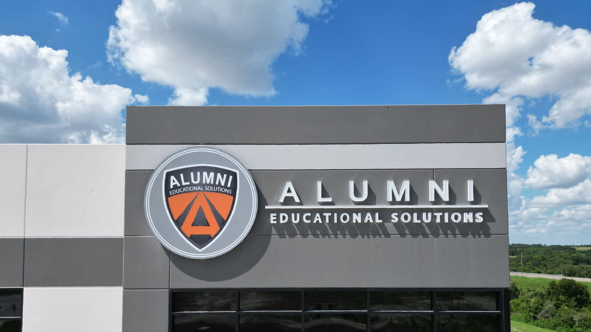Modern gray building with signage