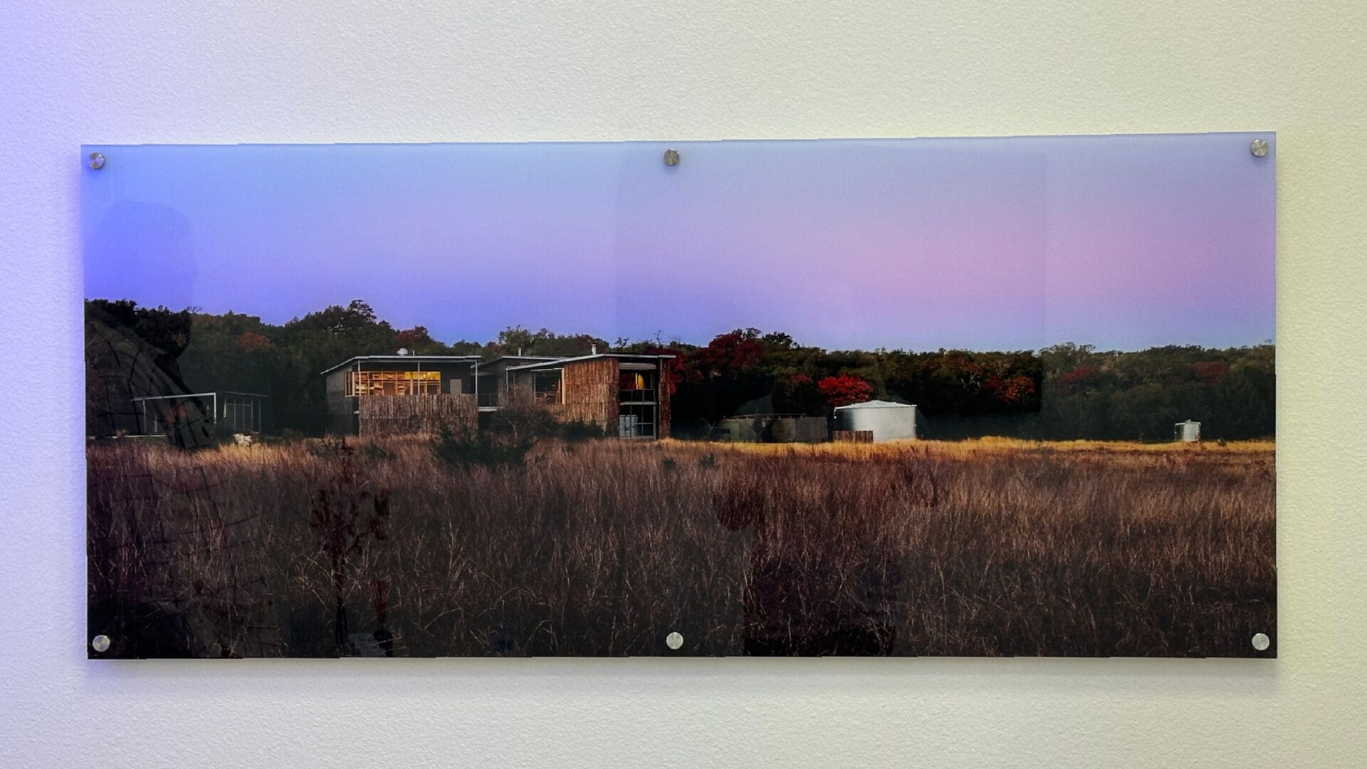 Acrylic print of farmhouse under purple sky